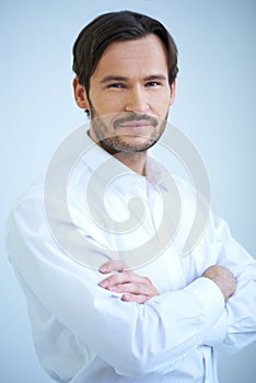 Smiling man in shirtsleeves