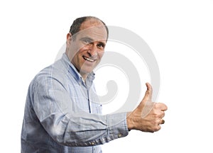 Smiling man with thumbs up positive sign