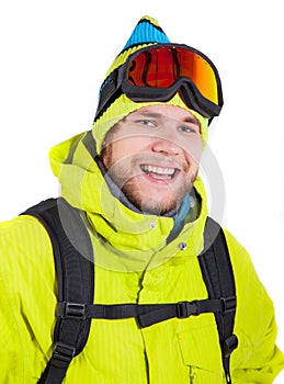 Smiling man wearing winter sports gear