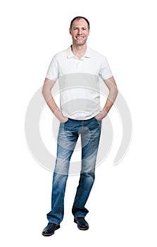 Smiling man in white t-shirt and jeanse isolated on white background