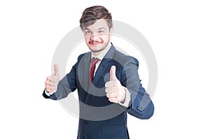 Smiling marketing manager showing thumbs up