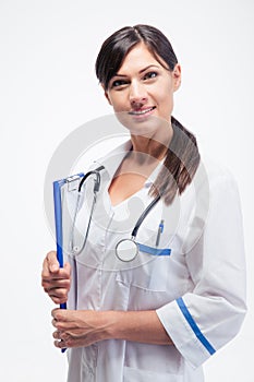 Smiling medical doctor with clipboard