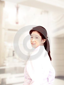 Smiling medical doctor woman