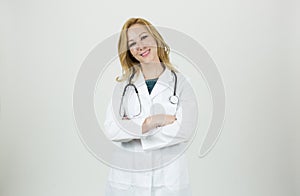 Smiling medical doctor woman with stethoscope. Female doctor teaching at medical school. Healthcare family doctor portrait.