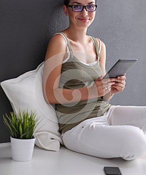 Smiling medical doctor woman with stethoscope in hospital