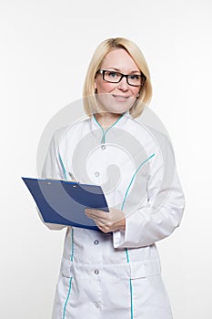 Smiling medical doctor woman with stethoscope. Isolated over white background