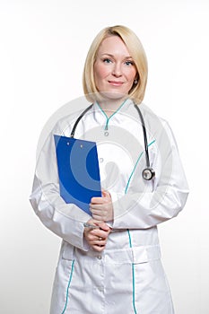 Smiling medical doctor woman with stethoscope. Isolated over white background