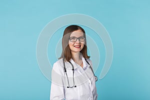 Smiling medical doctor woman with stethoscope over blue background with copy space