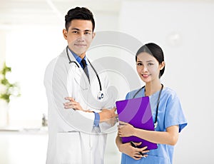 Smiling Medical doctors working in the office