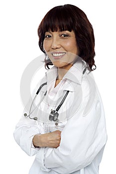 Smiling medical expert posing with arms crossed