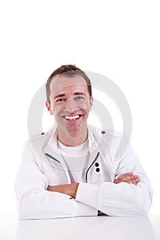 Smiling middle-age man sitting at desk