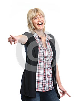 Smiling middle age woman pointing on you