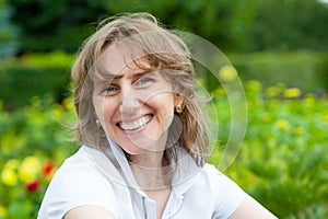 Smiling middle age woman portrait photo