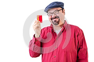 Smiling middle aged man with credit card
