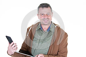 Smiling middle aged man using tablet digital smartphone phone computer isolated on white background