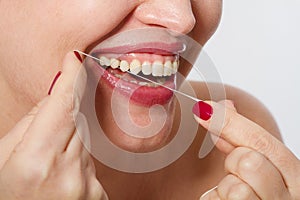 Smiling middle aged woman with ideal strong white teeth, teethcare. Selective focus. Healthcare, stomatological concept for dentis