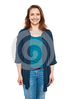 Smiling middle aged woman wearing blue cardigan