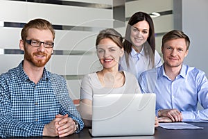 Smiling millennial professional people with female leader team p