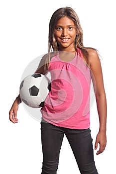 Smiling mixed race school girl holding football