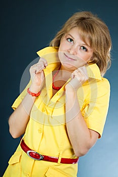 Smiling model in a yellow dress