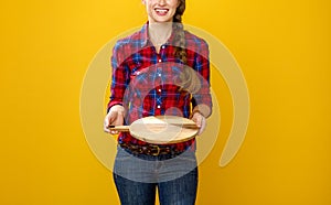 Smiling modern woman grower showing an empty trey