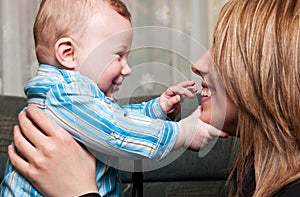 Smiling mother and baby