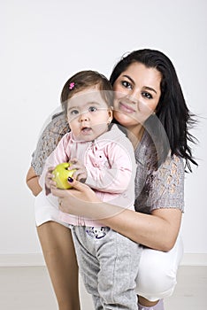 Smiling mother and baby girl