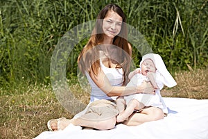 Smiling mother with baby girl