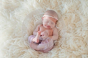 Smiling Newborn Baby Girl