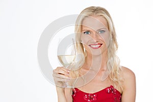 Smiling nordic girl holding a glass of white wine