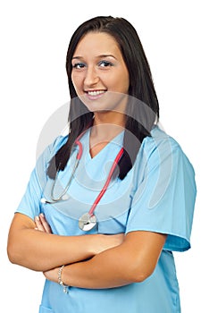 Smiling nurse with arms folded