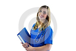 Smiling nurse holding clipboard