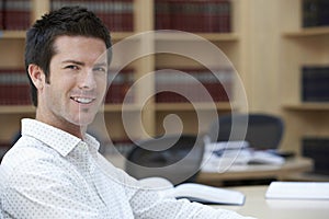 Smiling Office Worker In Office