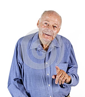 Smiling old man holding a walking stick sits on a chair