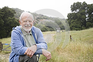 Smiling Old Man in Nature