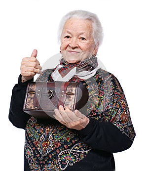 Smiling old woman with casket