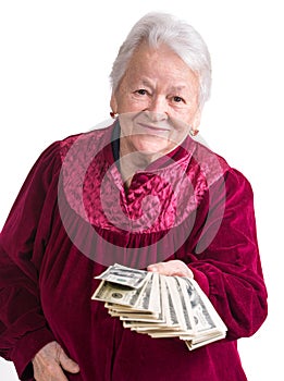 Smiling old woman holding money