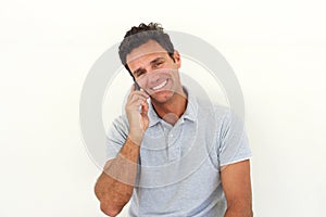 Smiling older man talking on cell phone