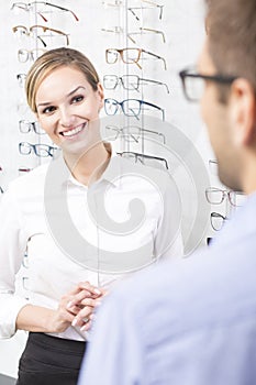 Smiling optician saleswoman