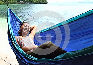 Smiling Papuan girl in tropical paradise