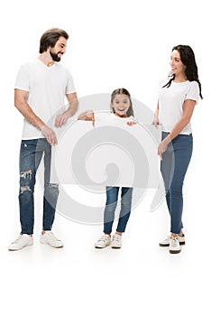 smiling parents and daughter with blank banner photo