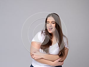 Smiling Plus Size attractive Woman dreaming.