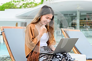 Smiling portrait of businesswoman working outdoor office