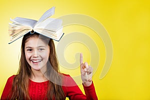 Smiling Portrait of a cute little schoolgirl loving to learn poi