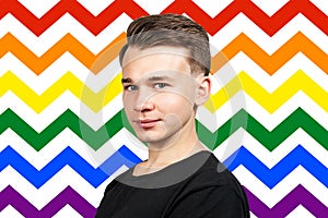 Smiling portrait white young man model dressed in black t-shirt looking at the camera