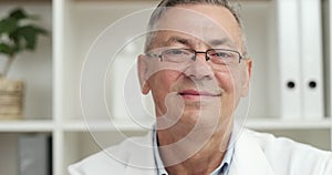 Smiling Positive Doctor At Work Looking at Camera