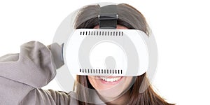 Smiling positive woman wearing virtual reality goggles headset
