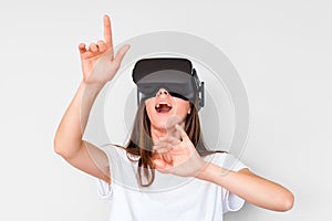 Smiling positive woman wearing virtual reality goggles headset, vr box. Connection, technology, new generation, progress concept.