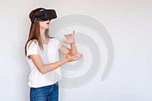 Smiling positive woman wearing virtual reality goggles headset, vr box. Connection, technology, new generation, progress concept.