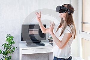 Smiling positive woman wearing virtual reality goggles headset, vr box. Connection, technology, new generation, progress concept.